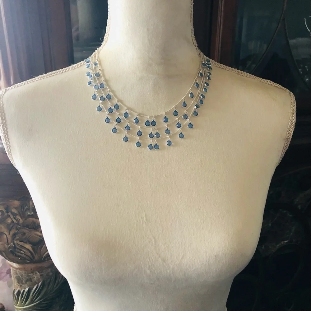 Vintage Anne Klein lion triple strand framed blue crystal dangle necklace